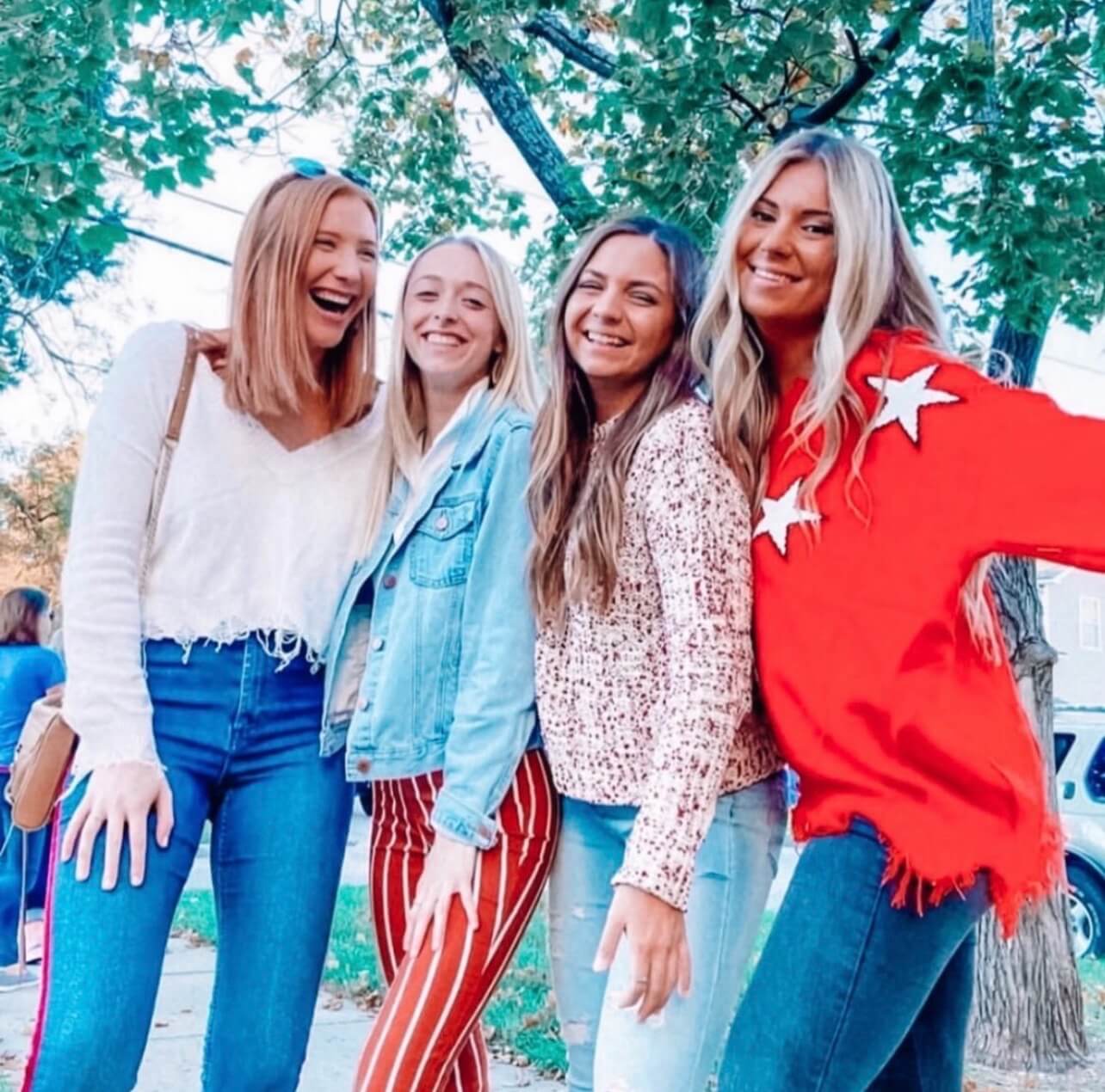a group of residents smiling outside